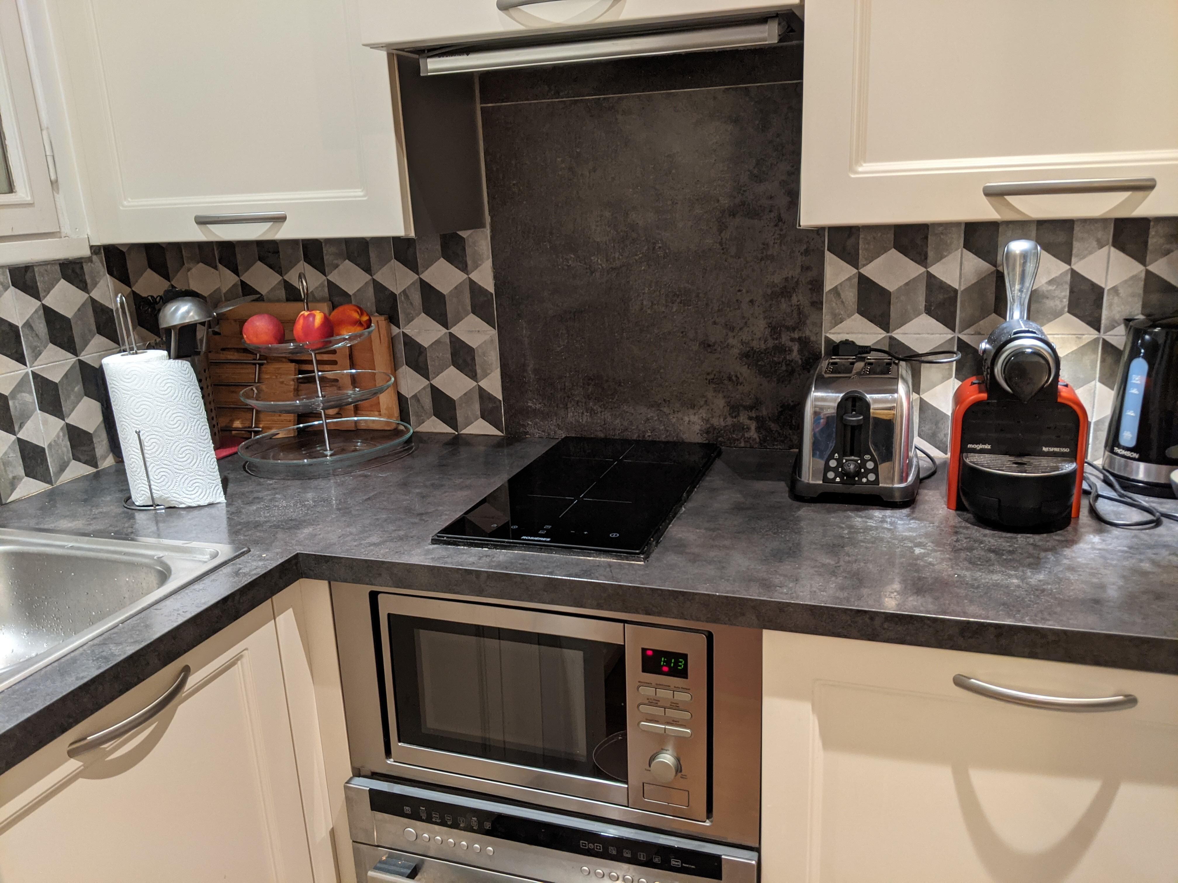 The cute little kitchen. Our host had fruit & coffee all ready for us!