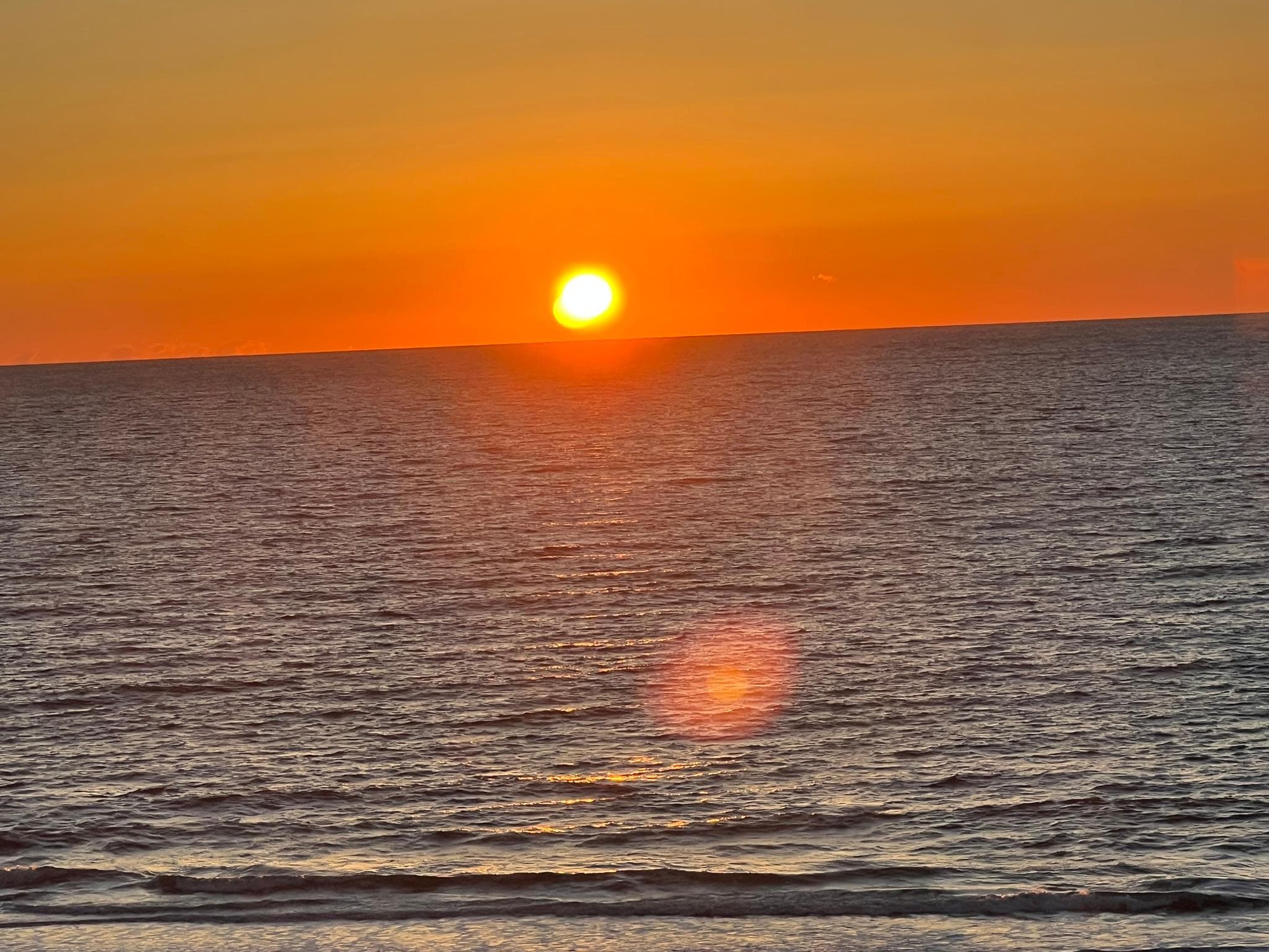 Watching the sunrise from the balcony