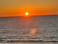 Watching the sunrise from the balcony