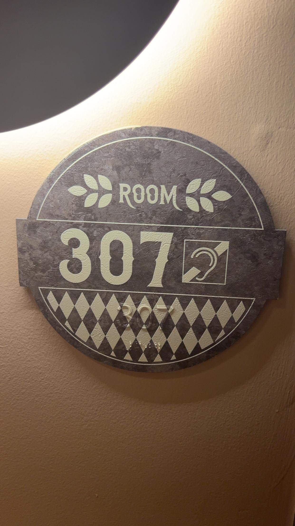 Room 307 was spacious. Room safe tucked in a drawer under the bed. An area under the bed to store a suitcase.