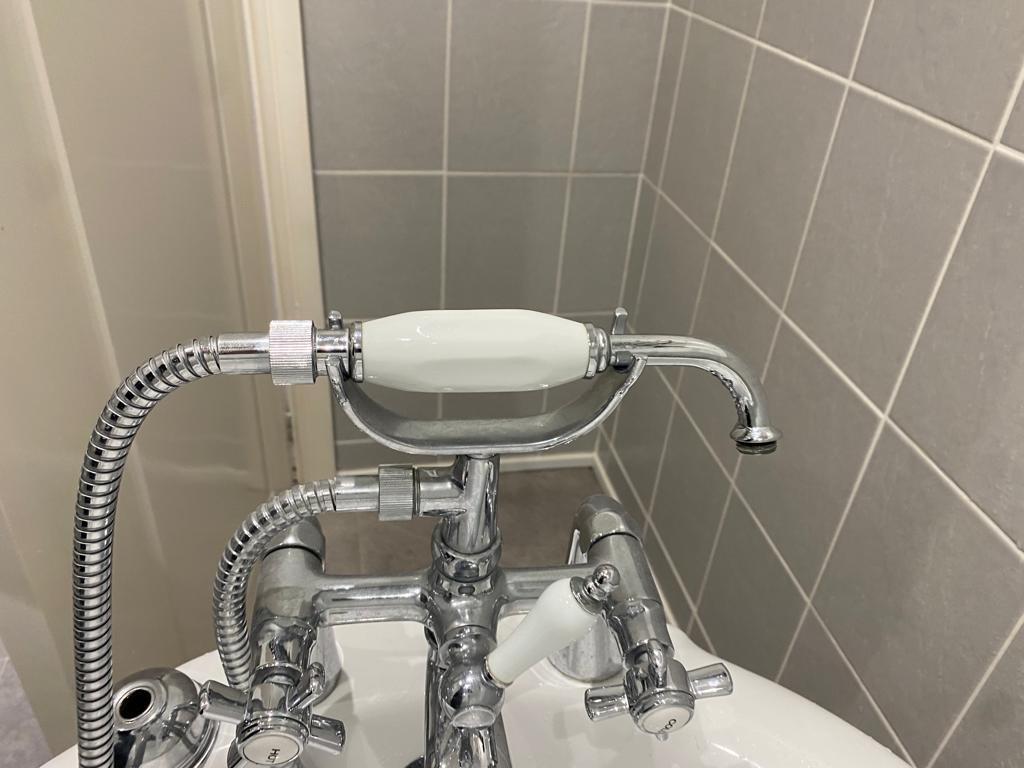 Shower head fell off and wouldn’t screw back on