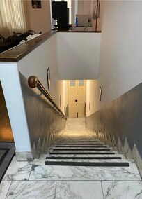 Very Steep stairs from lobby to ground level. It's not easy if you have any knee or ankle issues.