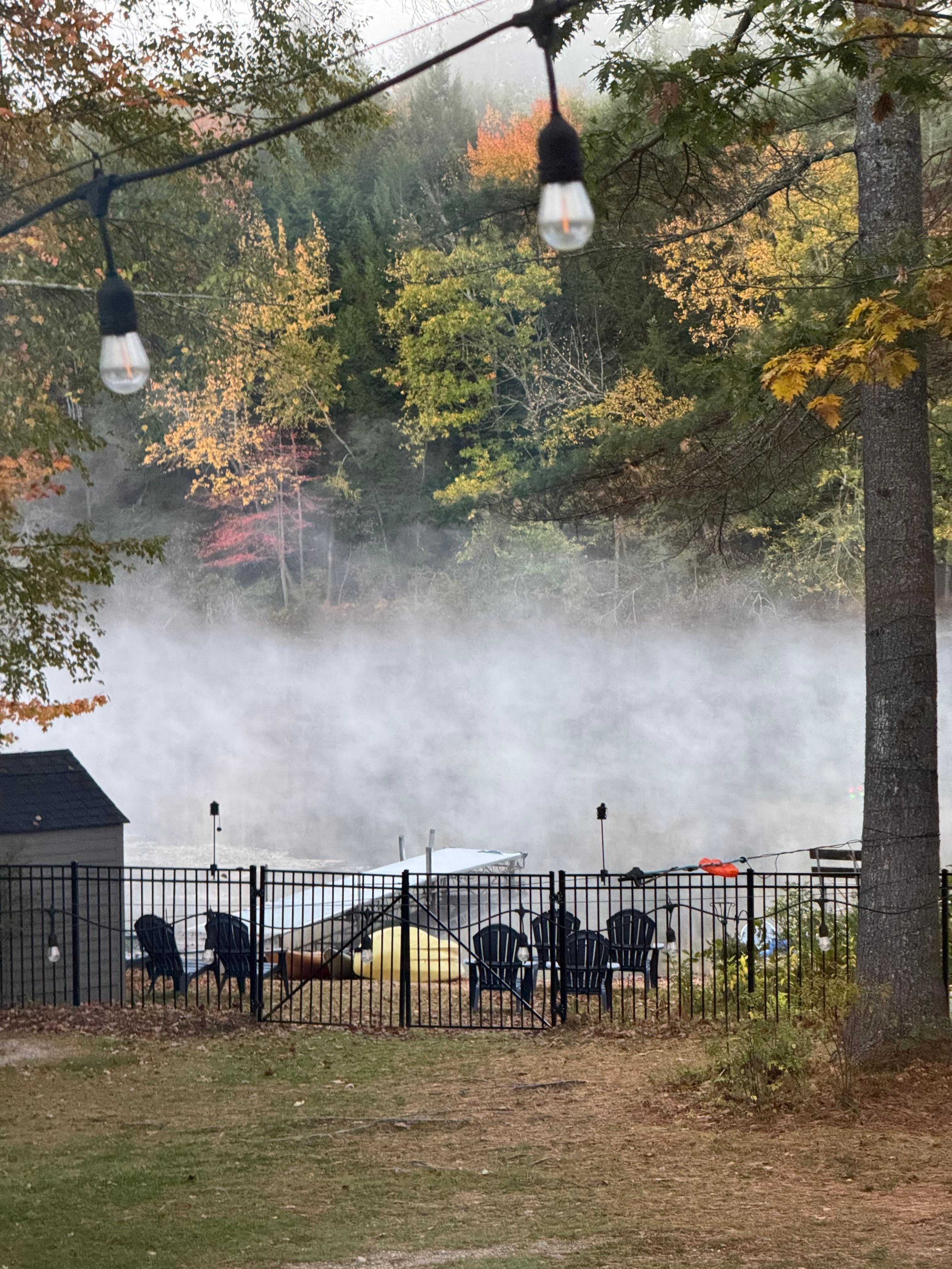 The fog  on the water after the temperature of the air got colder than the water.