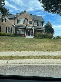 Front of host's house that she lives in with her family