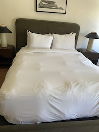 Bed inside the room.