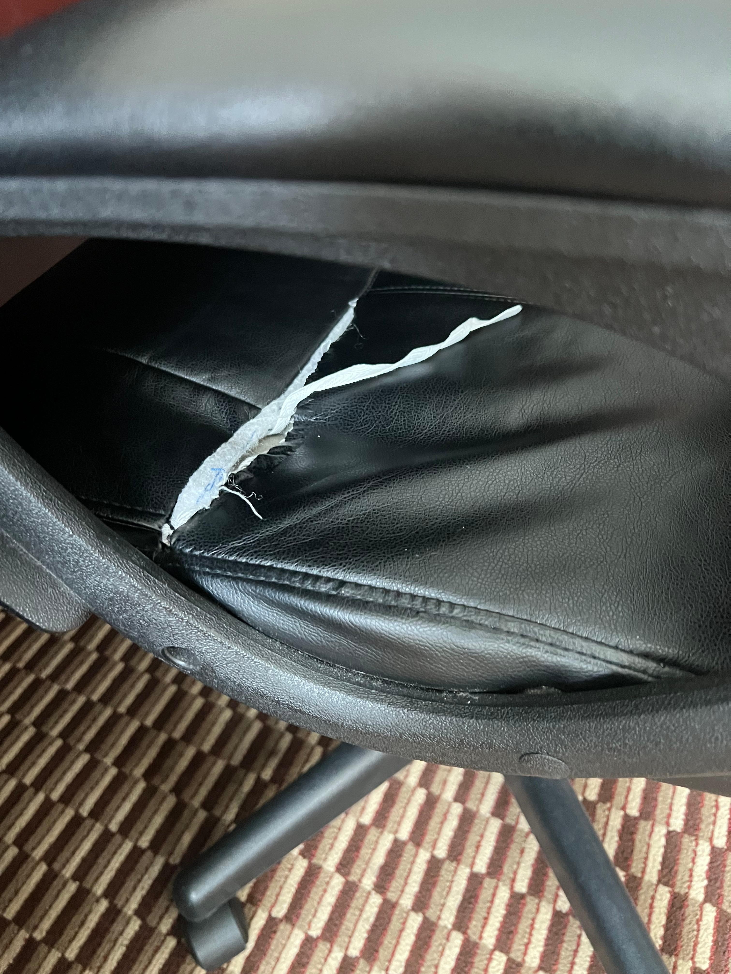 Torn desk chair 