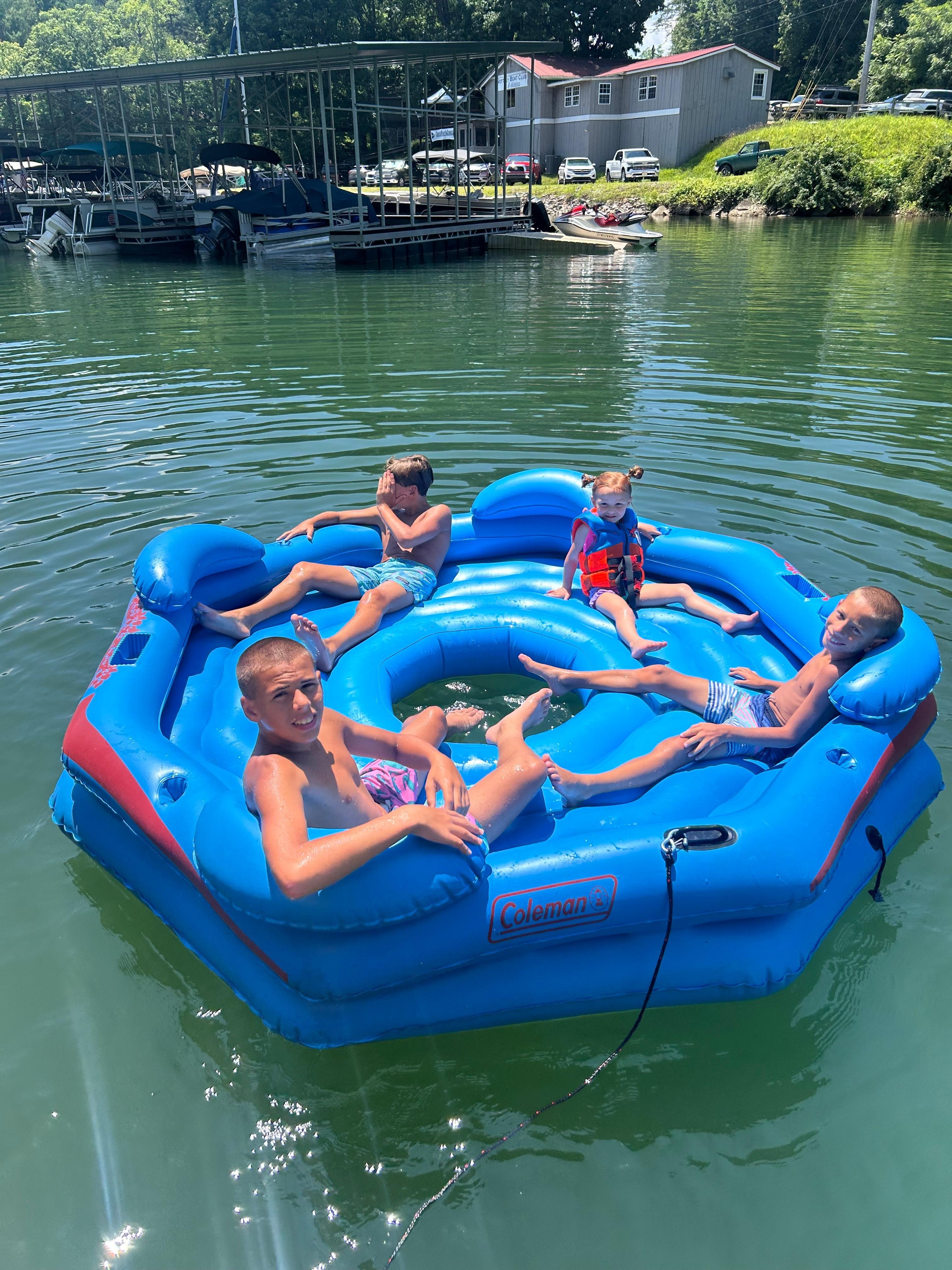 We enjoyed relaxing in the lake and on the dock .