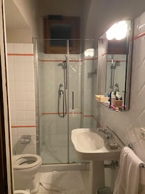 very small,
old and stinky bathroom