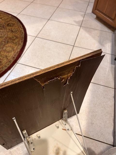 Garbage Pull out door, chipping away