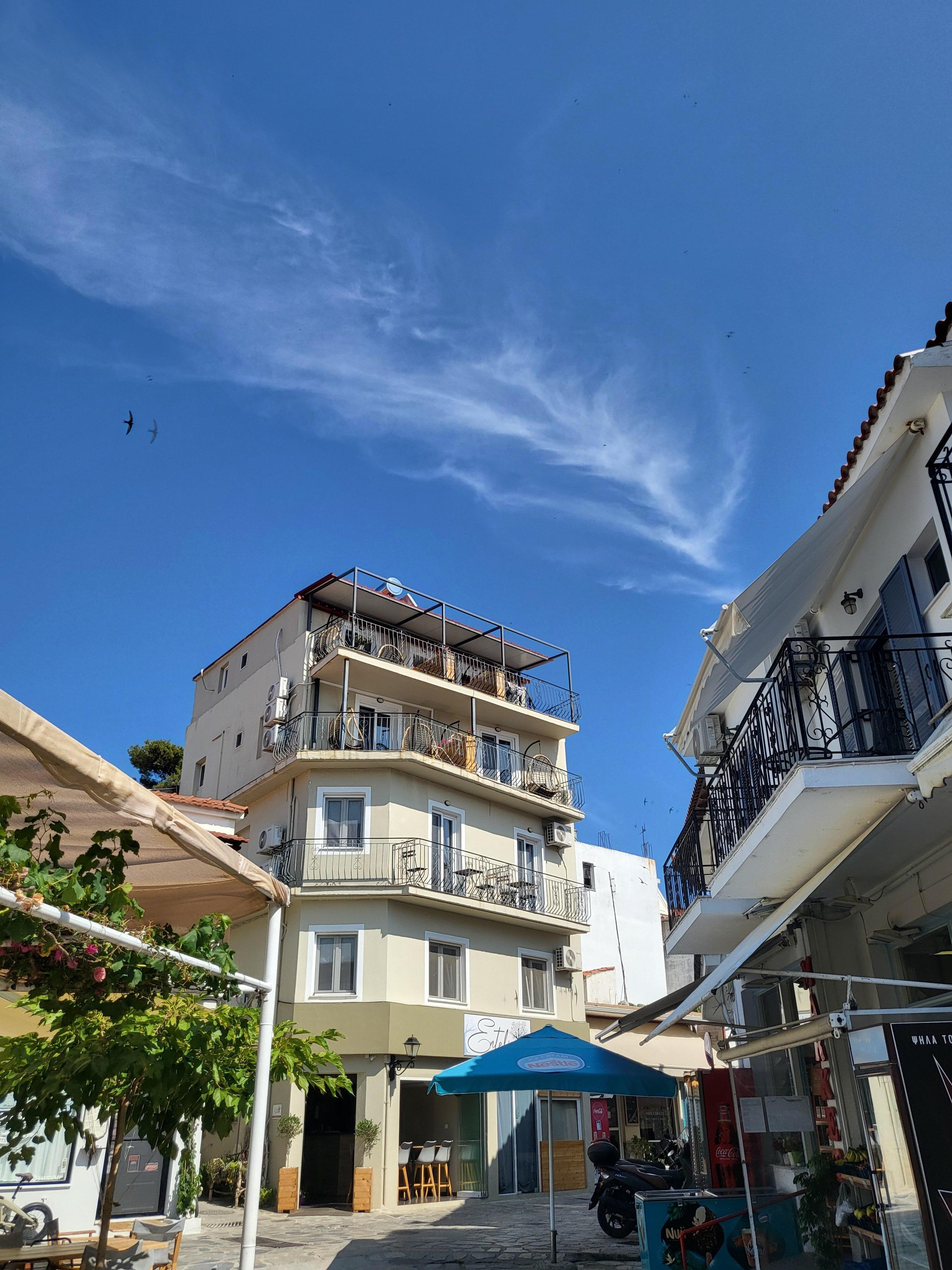 External view looking up at apartment. 