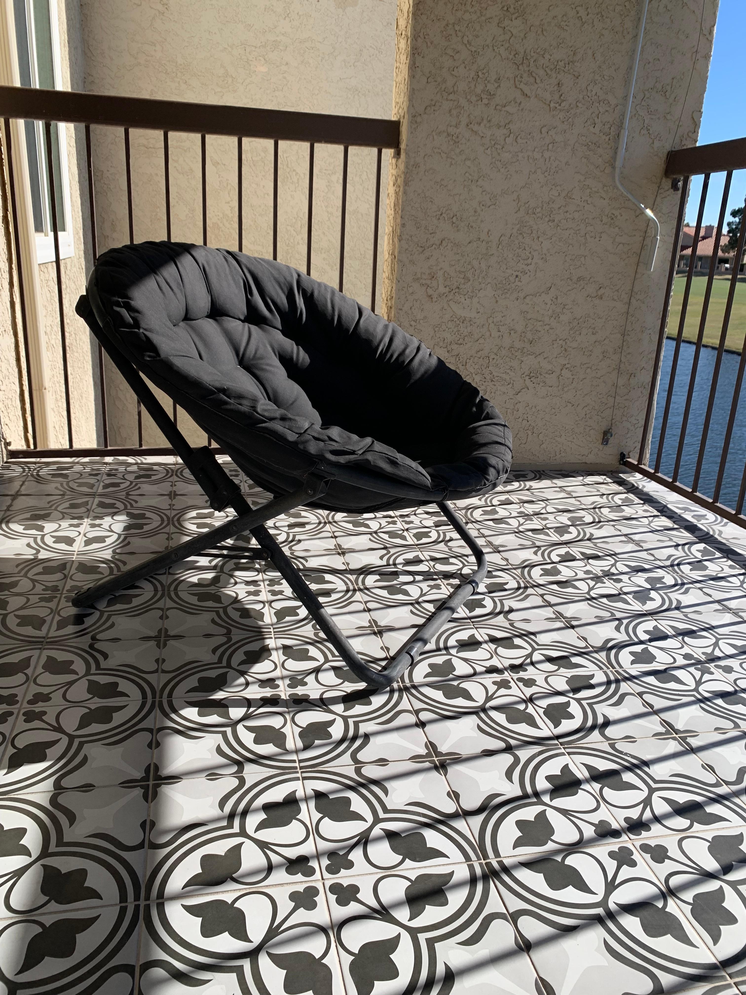 Camp chair on patio. 