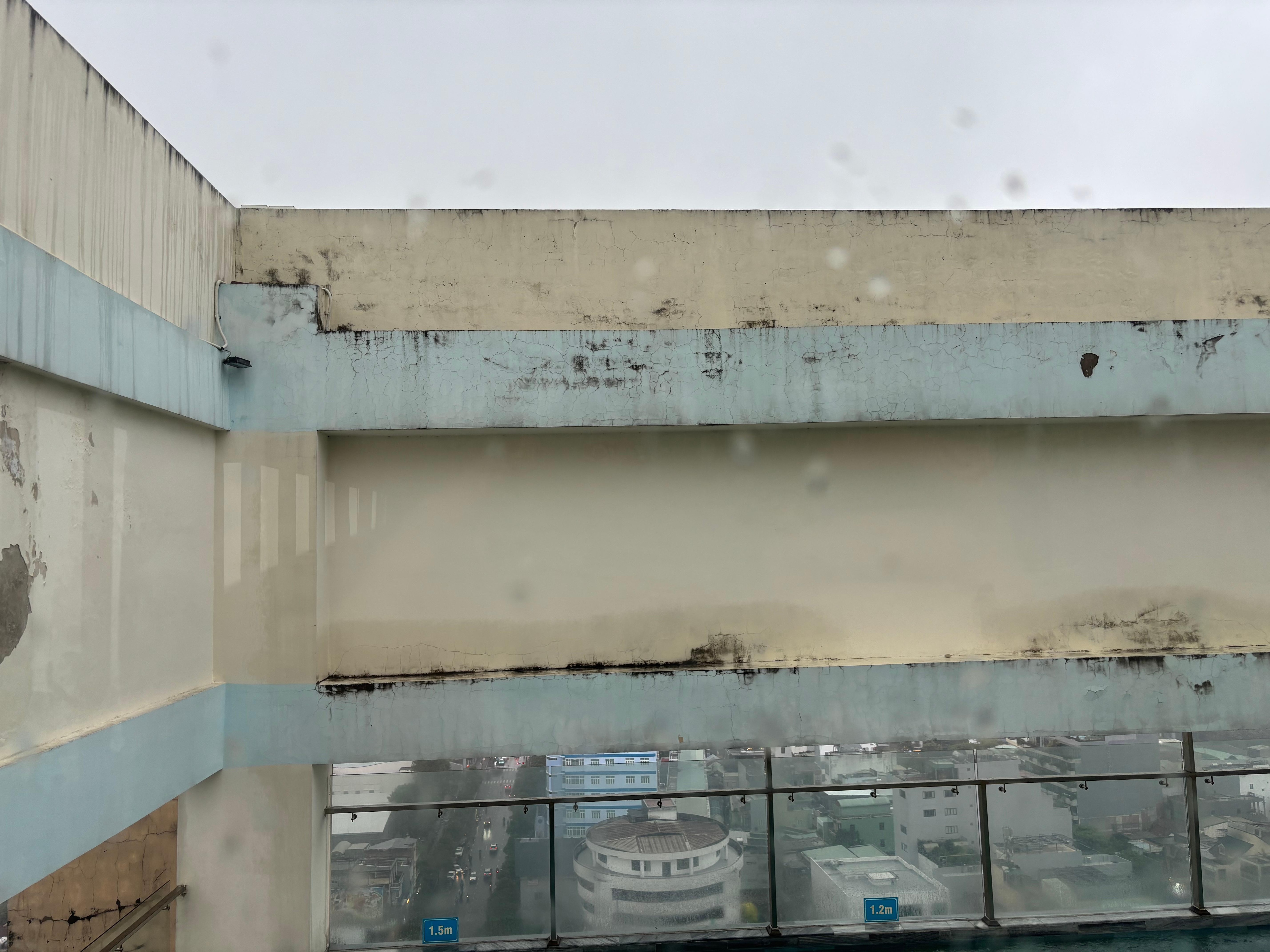 The paint on the pool area. Compare this picture to the ones they have online and make your decision freely about the general honesty and circumstance of their facilities. They will not care abiut any complaints you might have.