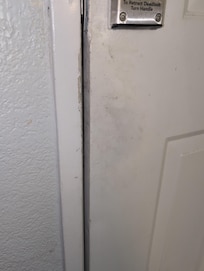 This is the entrance door to the room that is so disgusting and busted and filthy and wipes off with just some spray and a towel, instead let's just leave it for every other guest to add their dirt and oils on top of🙄