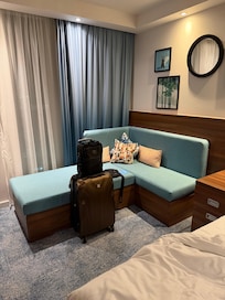 Corner Sofa Area was ideal fo luggage and clothes.