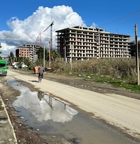 Main road behind hotel.