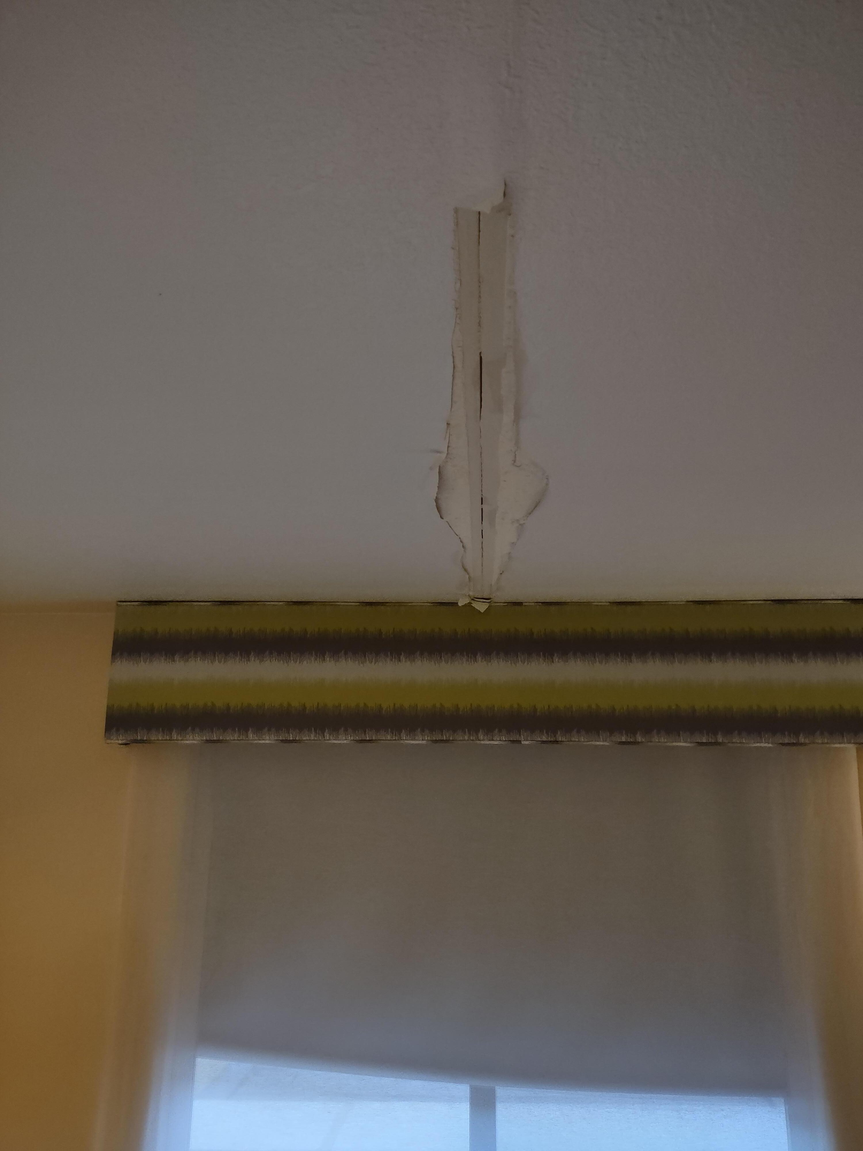 Sheetrock falling down from ceiling.