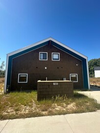 Front of home at driveway.
