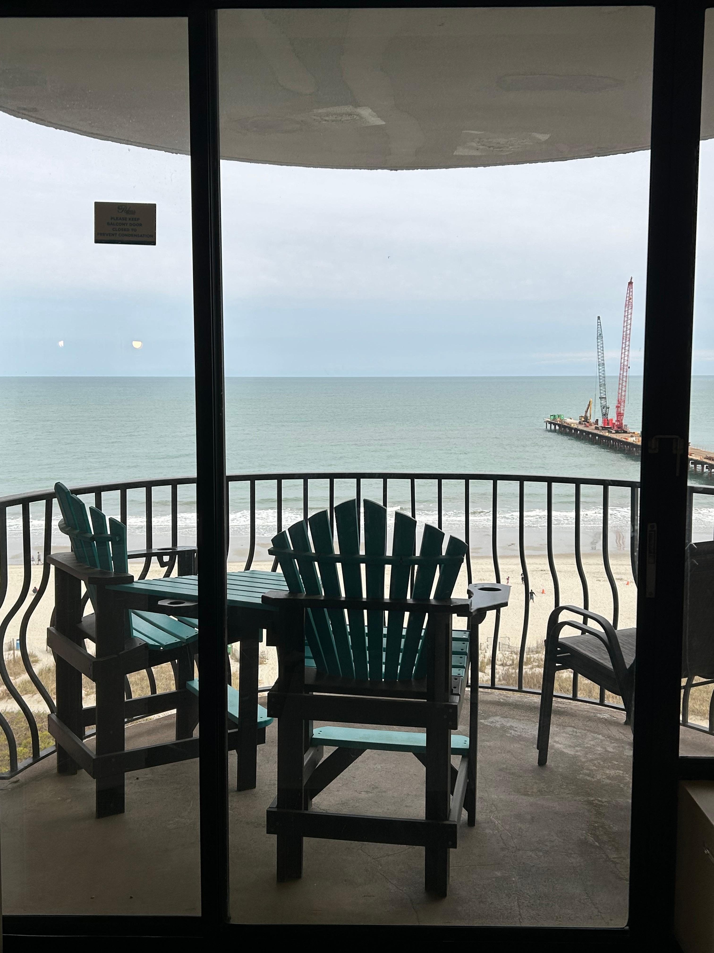 View from the main living onto the condo balcony 