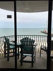 View from the main living onto the condo balcony