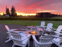 Fire pit at sunset (photo altered only to remove people in chairs for privacy)