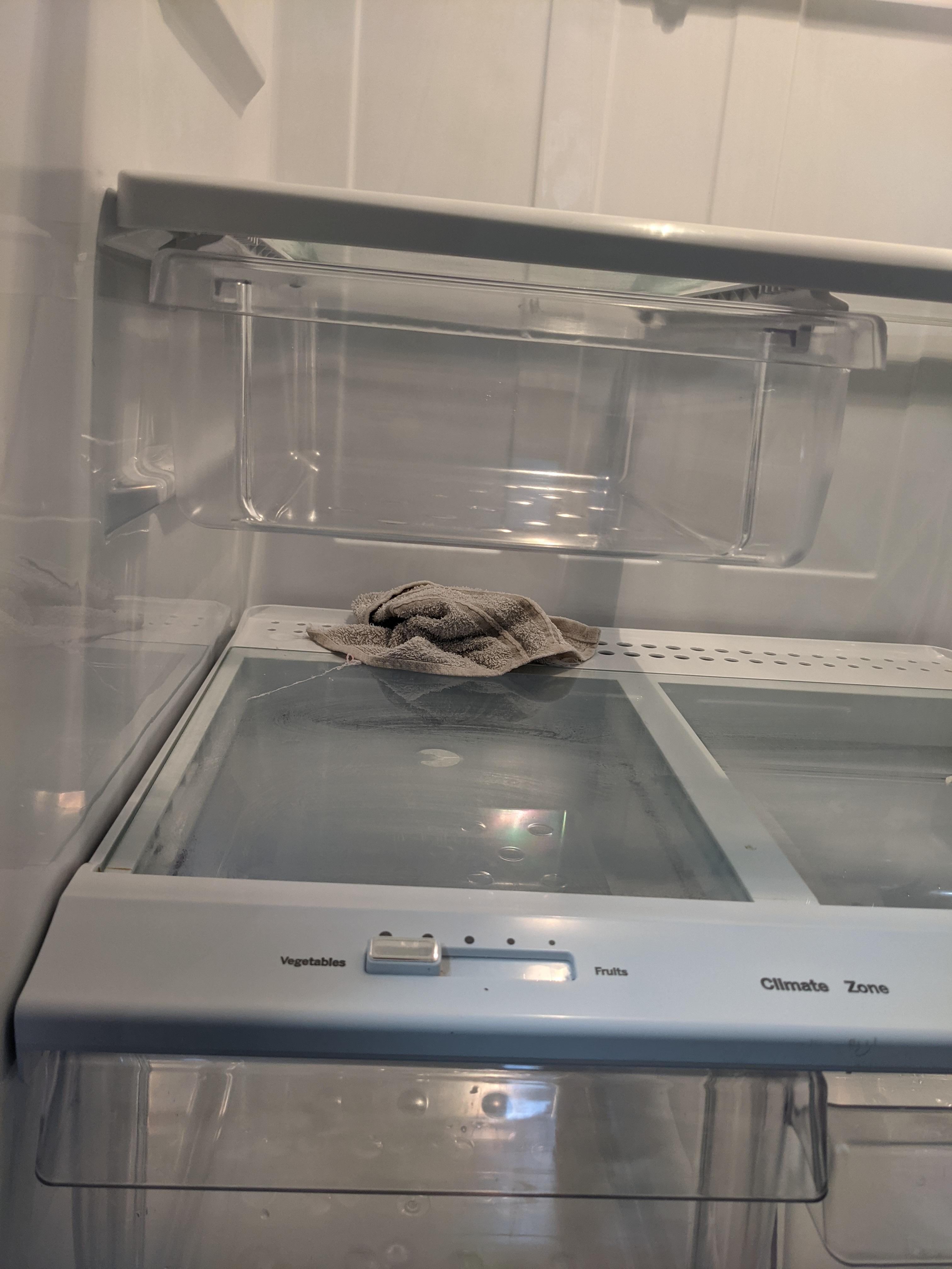 Dirty rag on fridge. 