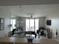Photo of living room and balcony.