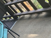 Lots of dirt by the railing.