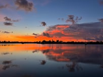 Sunset from backyard seawall.