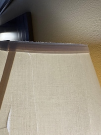 Top of lamp shade dusty