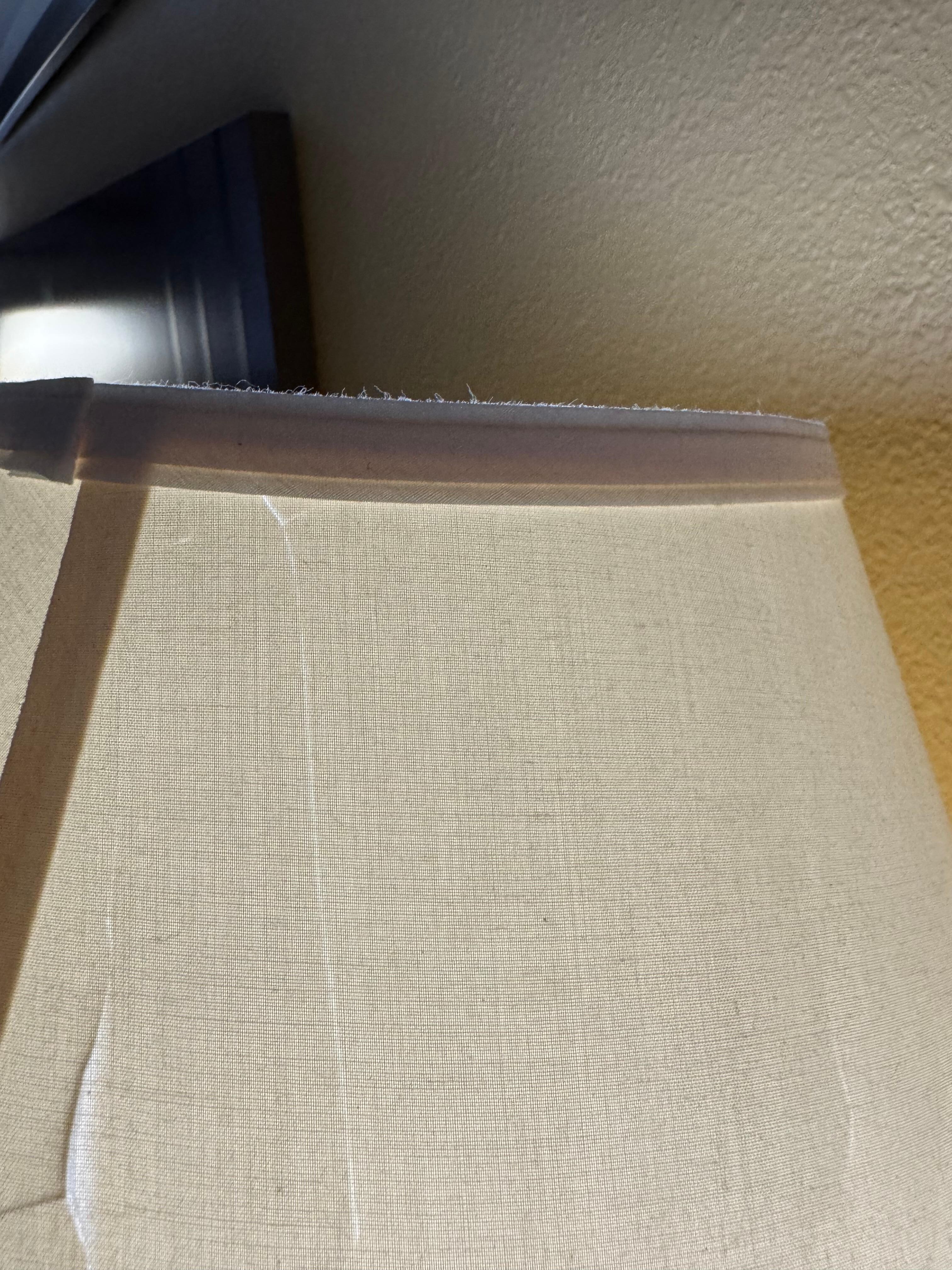 Top of lamp shade dusty