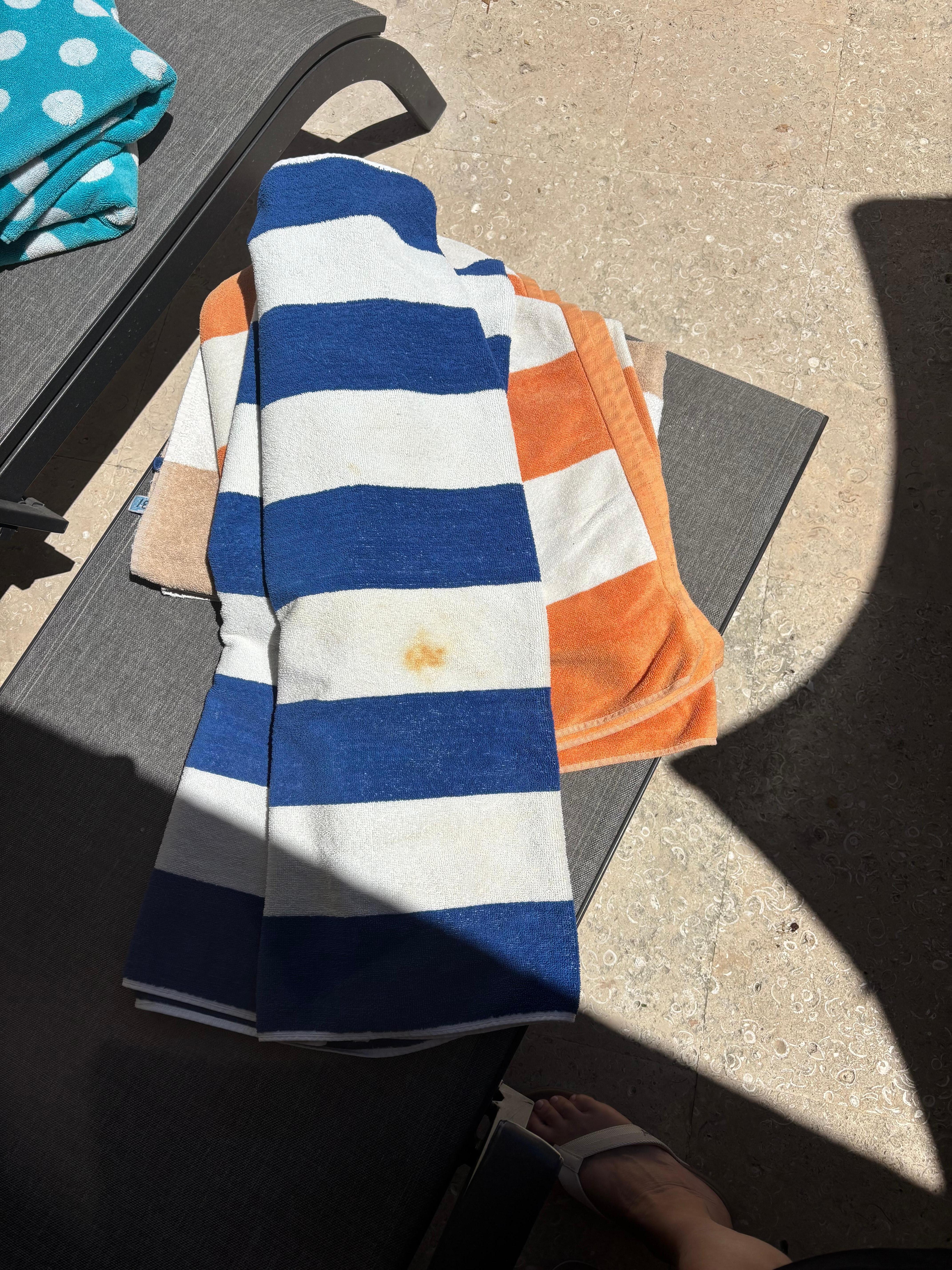 Beach towels worn and stained