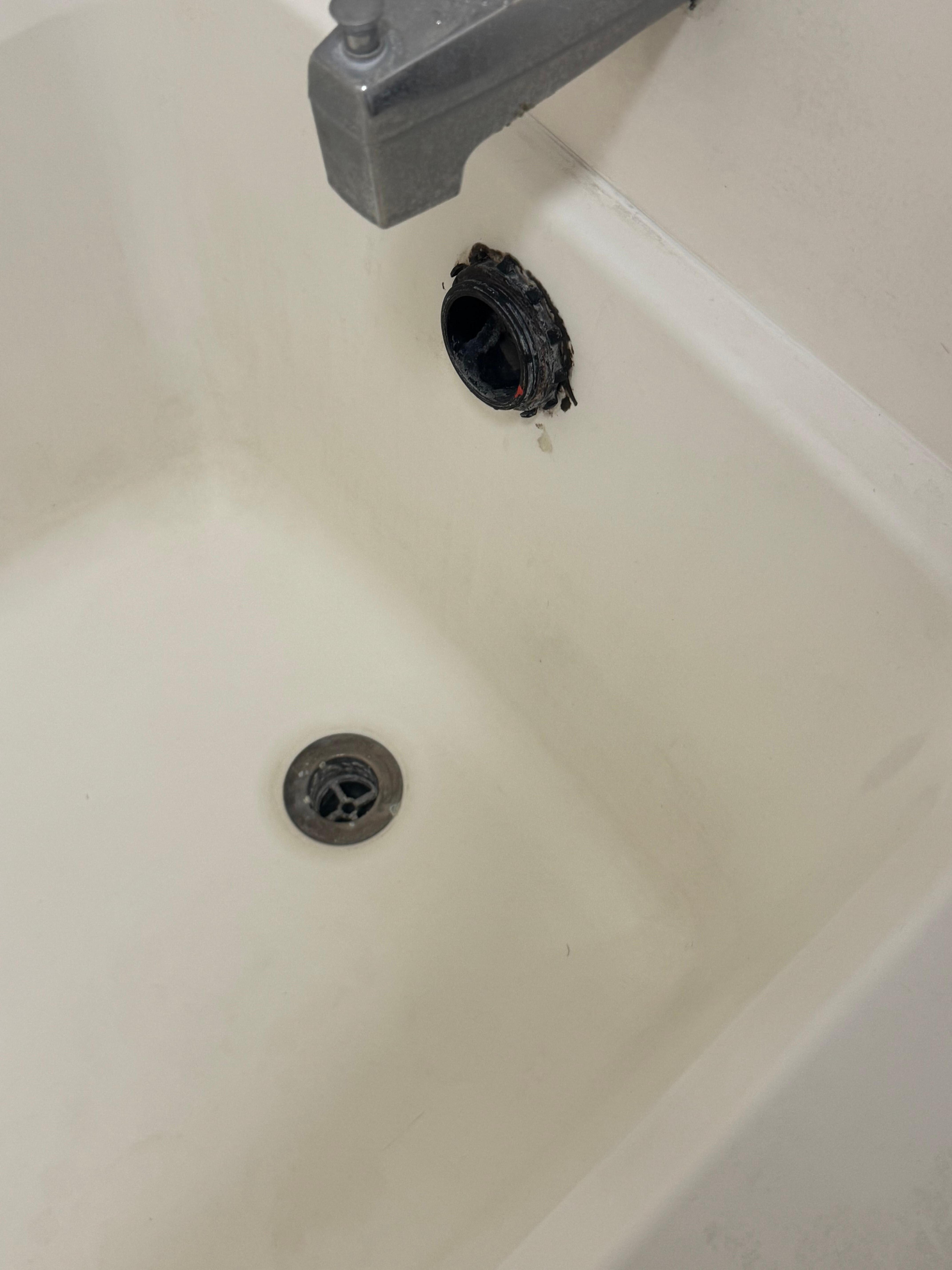 Bath tub. Roaches were coming out of the hole. 