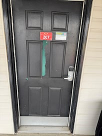 Our door didn’t lock without help of a crowbar and the paint was peeling.