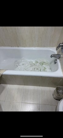 There was a dirty blanket in the tub.