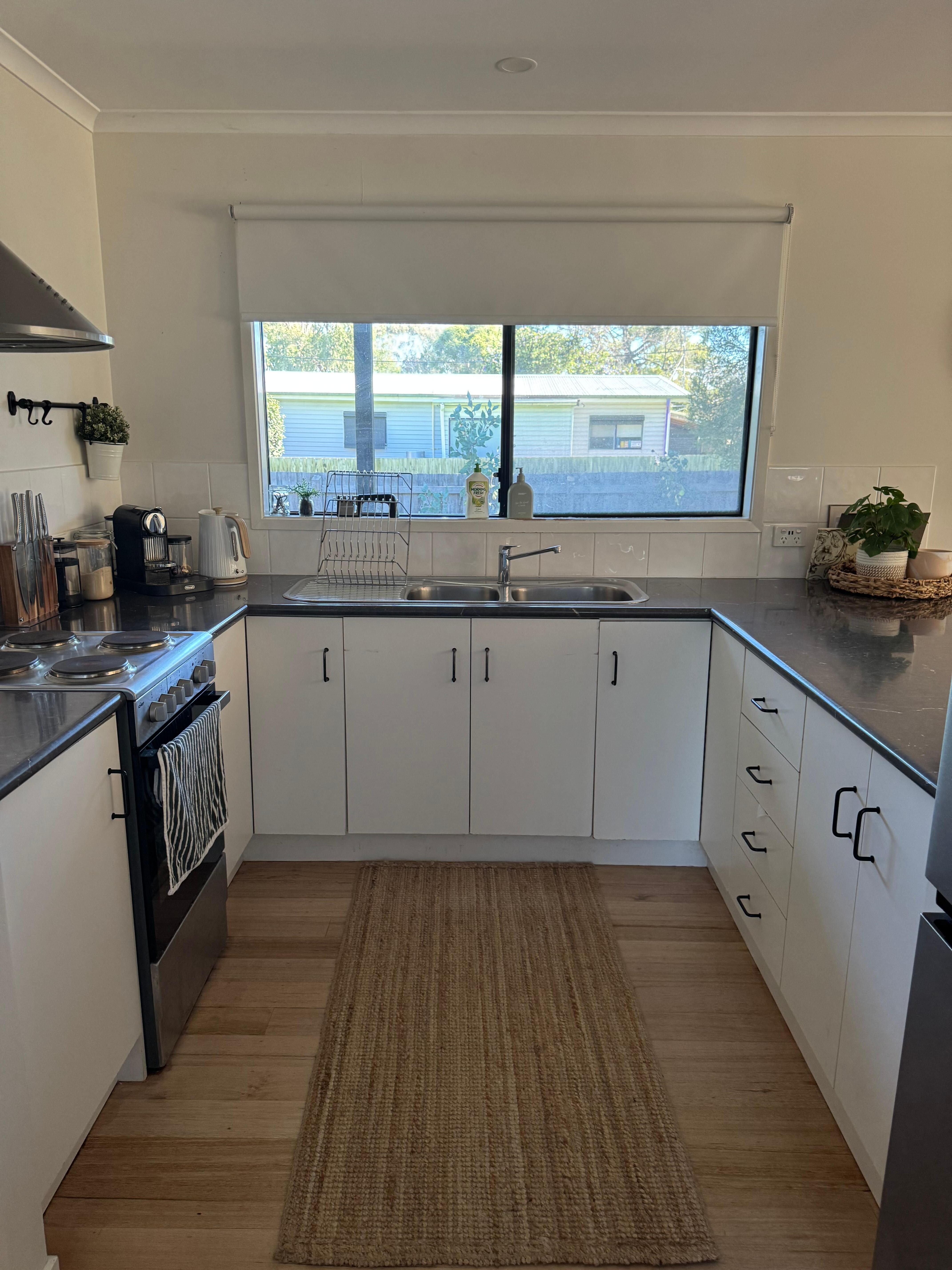 Overlooking dining and lounge area from kitchen 