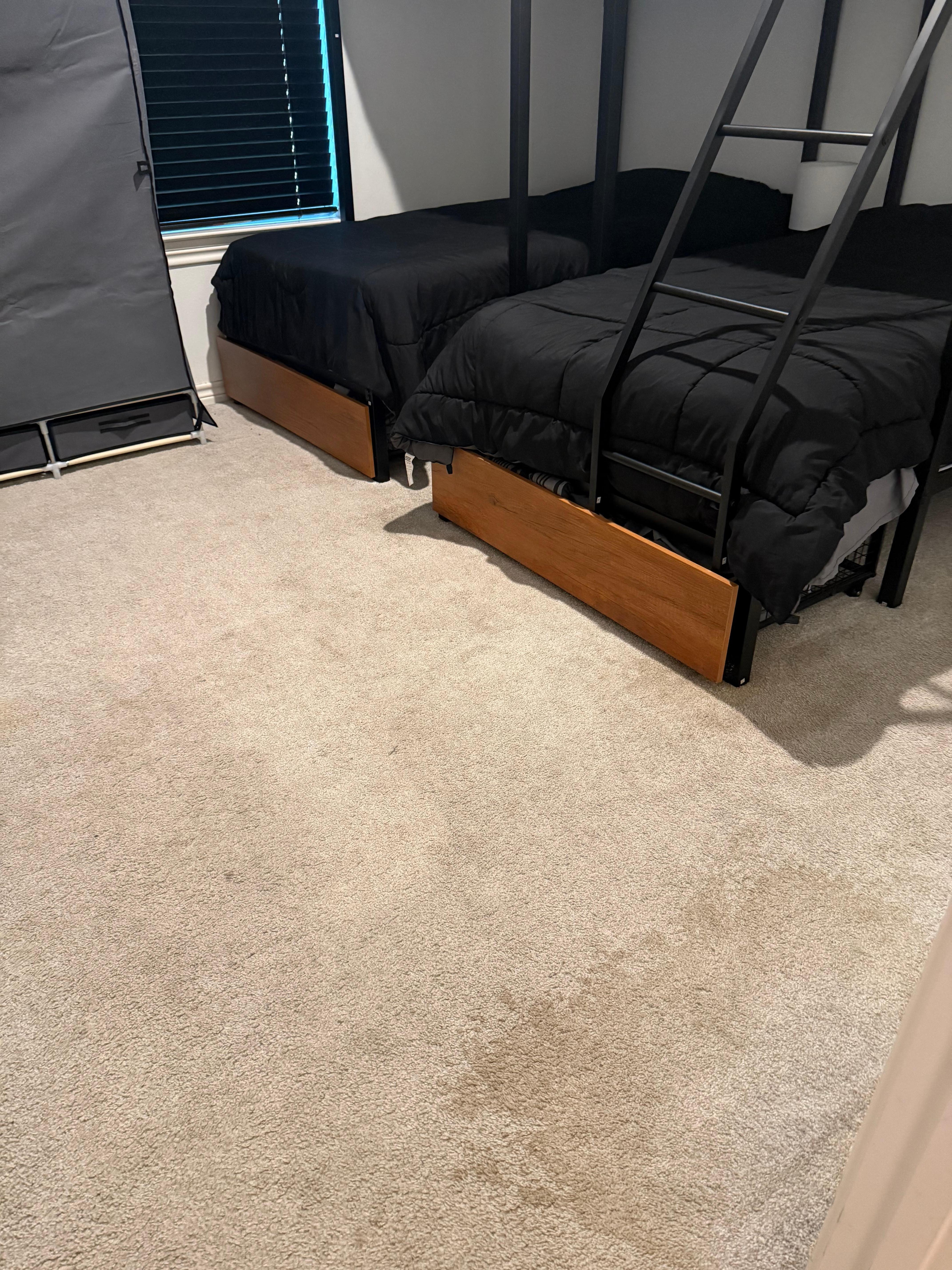 Stained carpet in yet another room