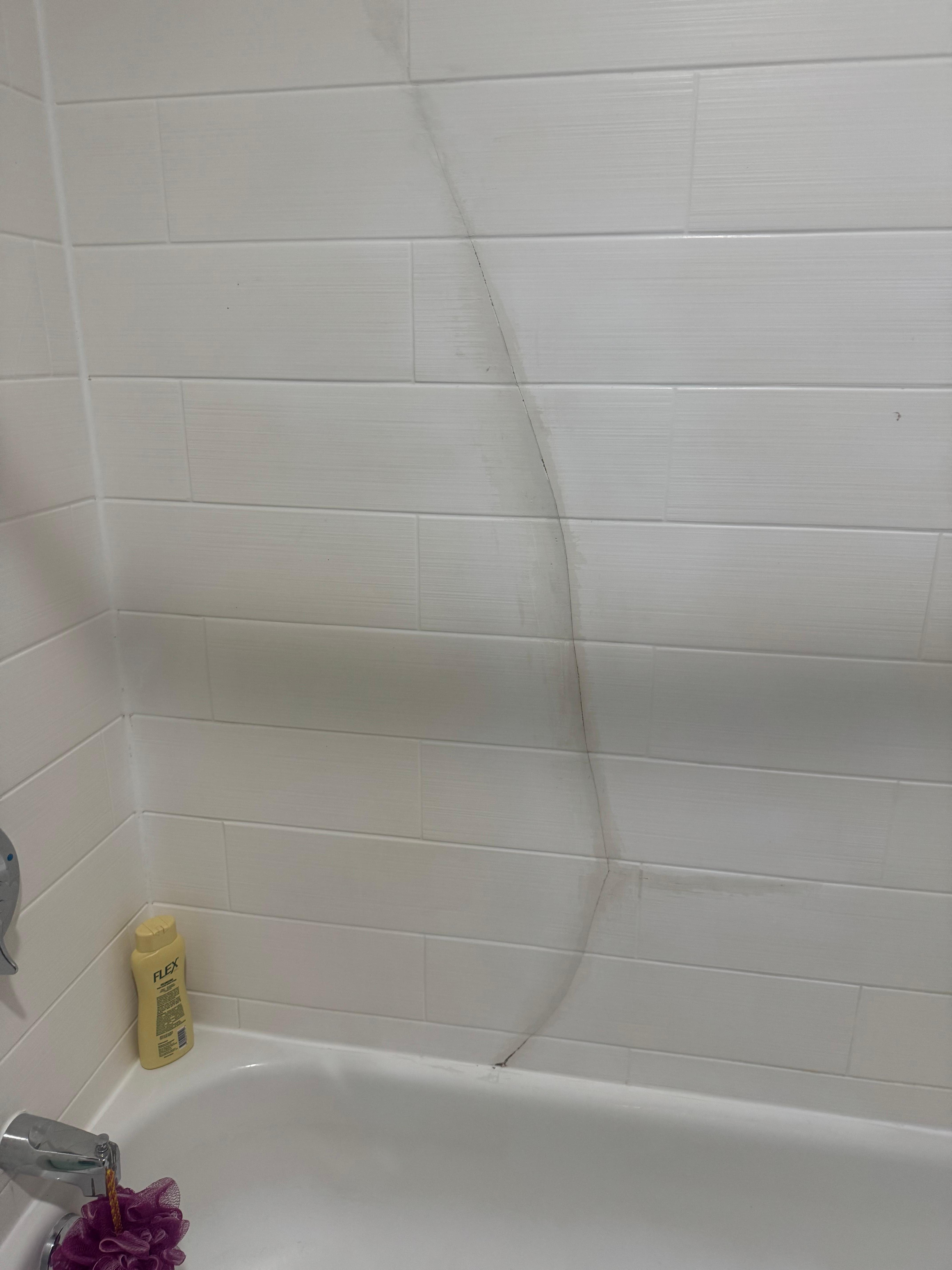 Big crack in shower wall & tub seemed stained but room was nice & comfy overall 