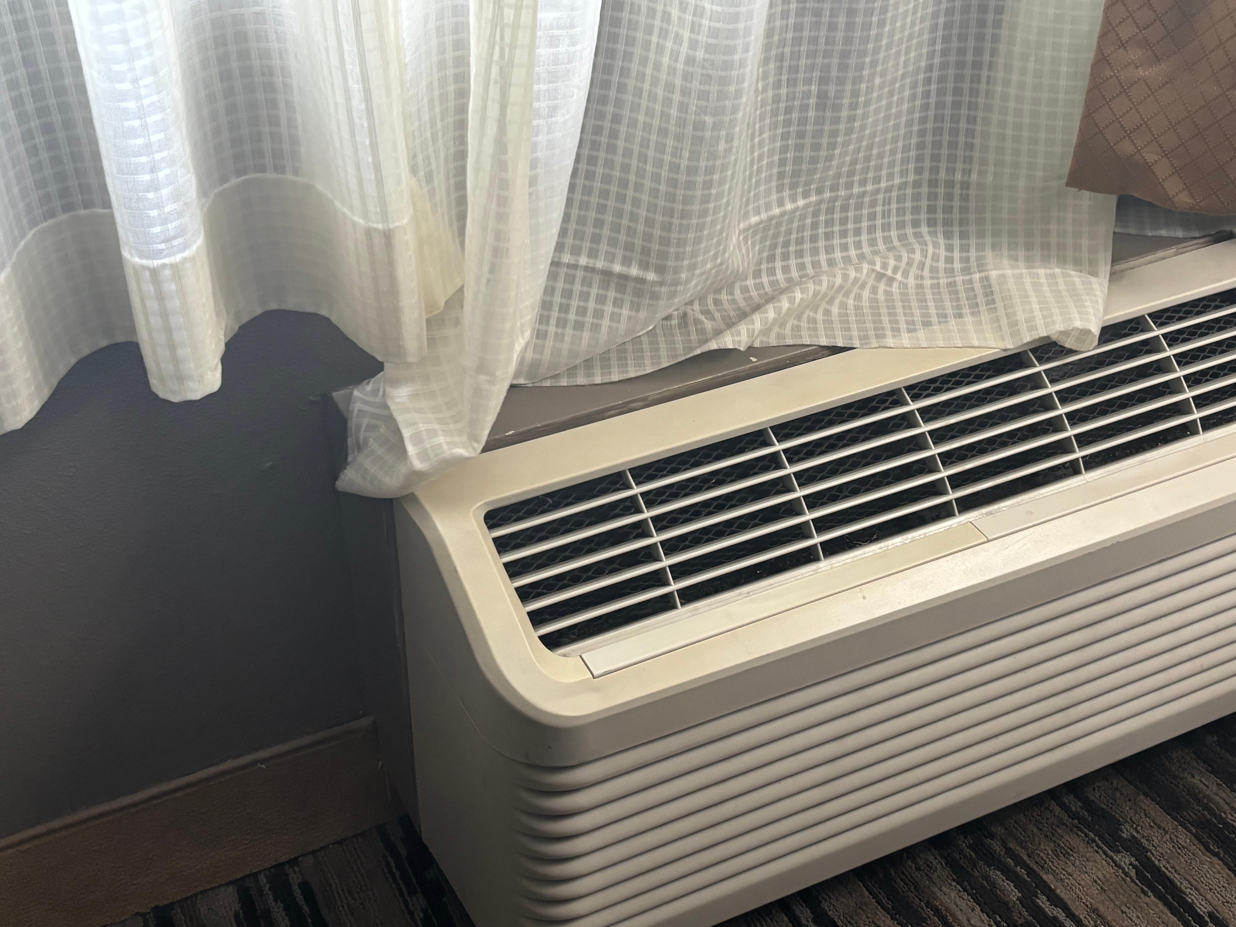 The hem in the curtains was missing and hanging down 