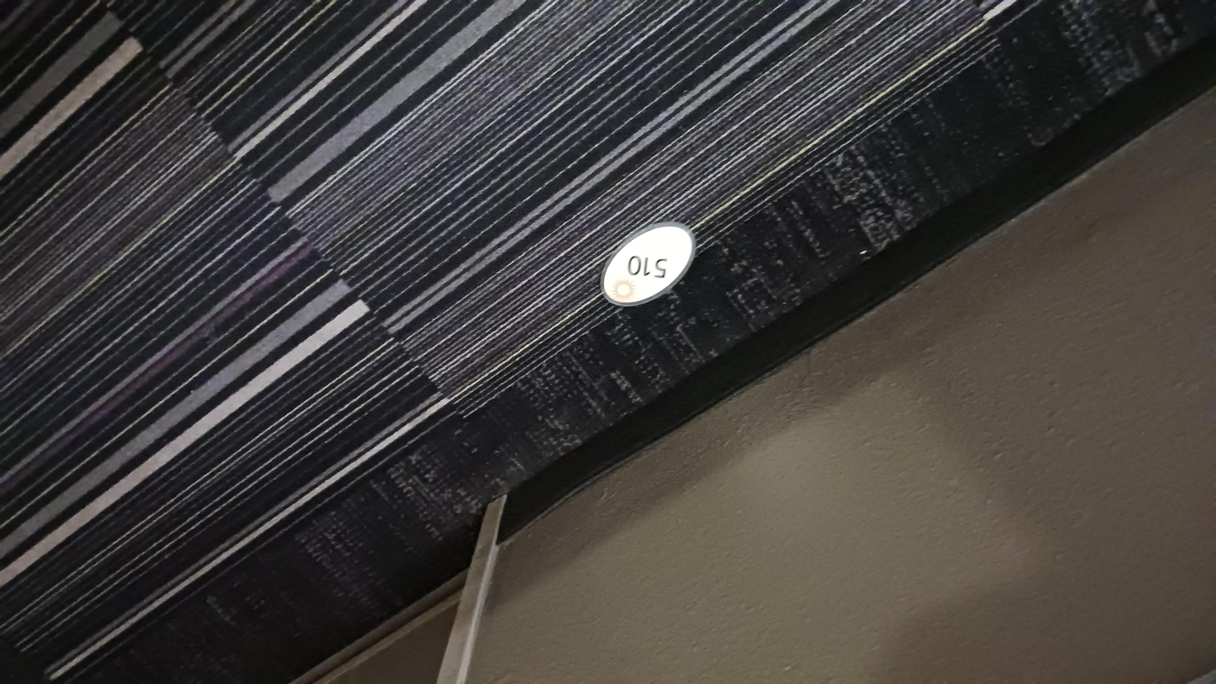 Room number that had fallen off the wall (not our room)