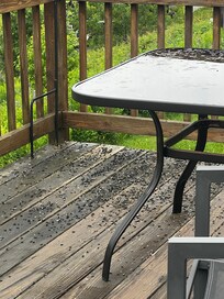 We swept everyday but bird feeders are too close to the deck.