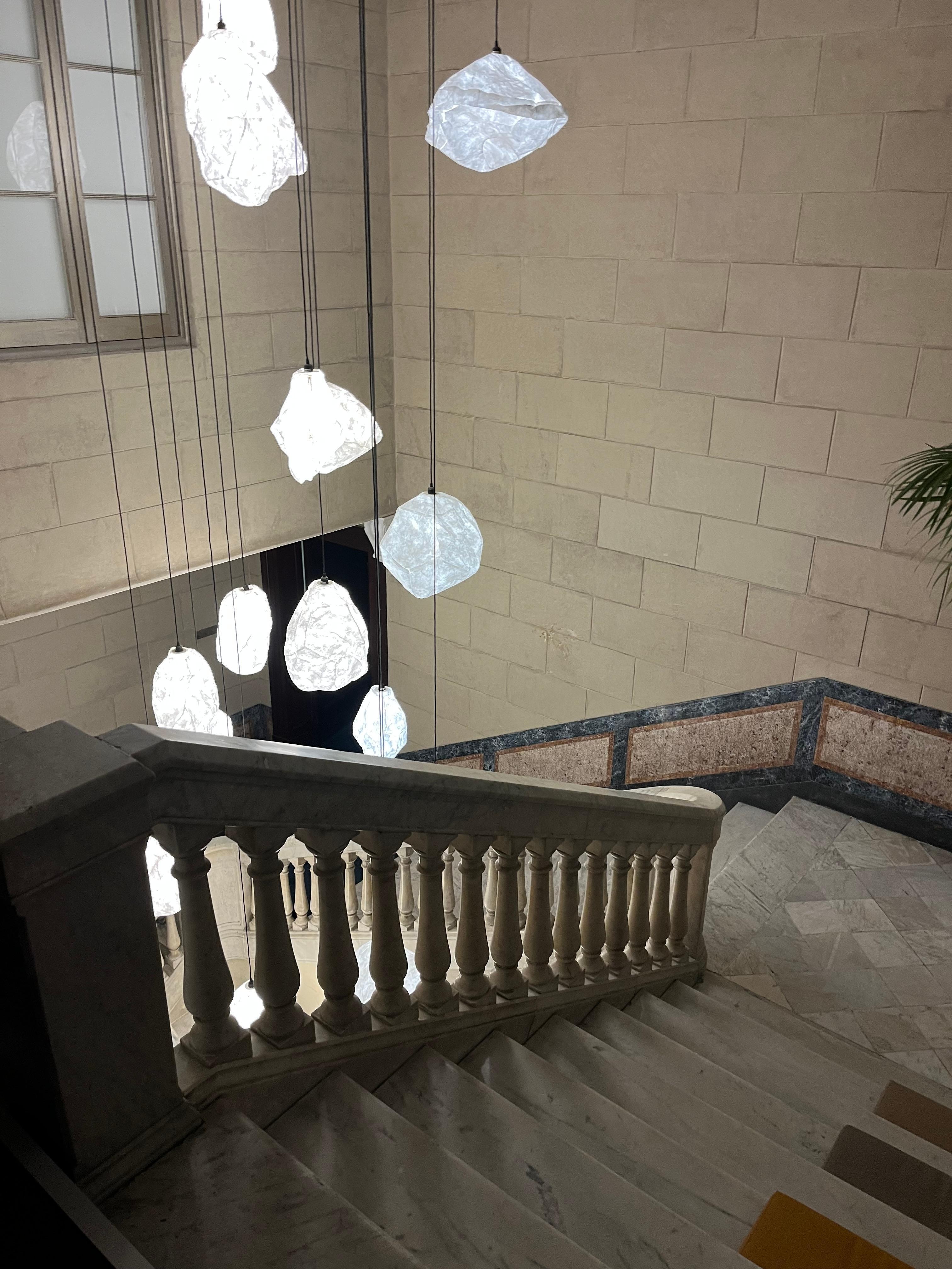Marble staircase and floating form lamps to the mini gym and 4 rooms