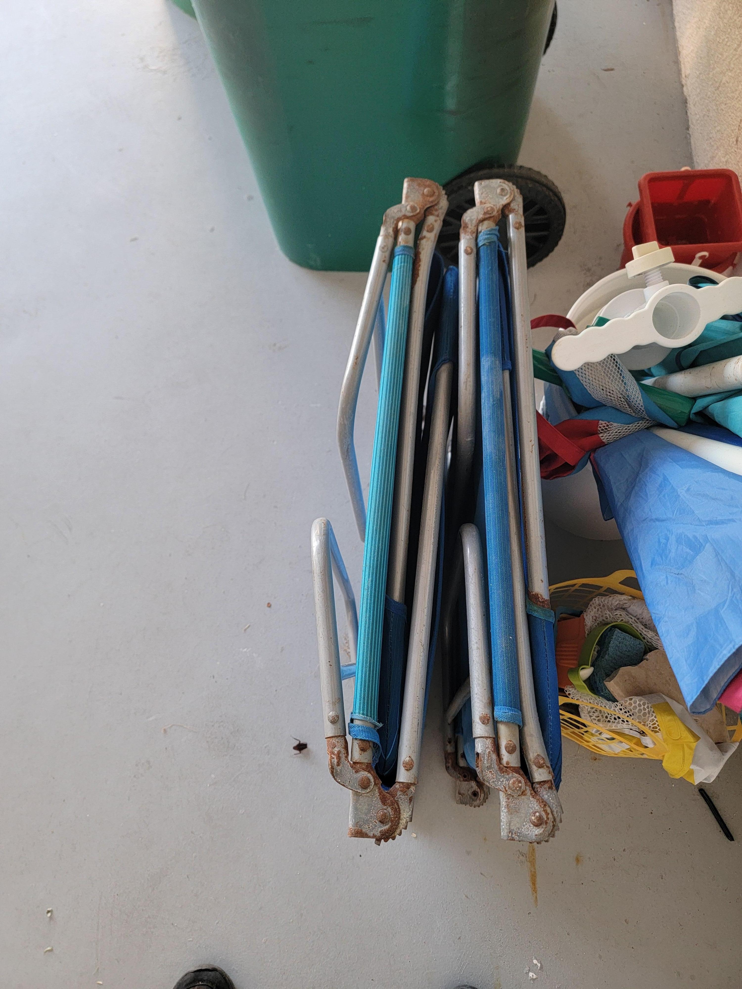 broken beach chairs - rusted out