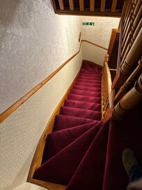 Stairs to top floor rooms!