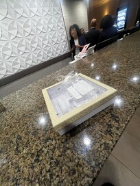 Me taking the roaches to the front desk.