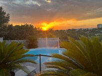 Pool and view at sunset