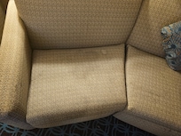 Picture of stains on sofa.