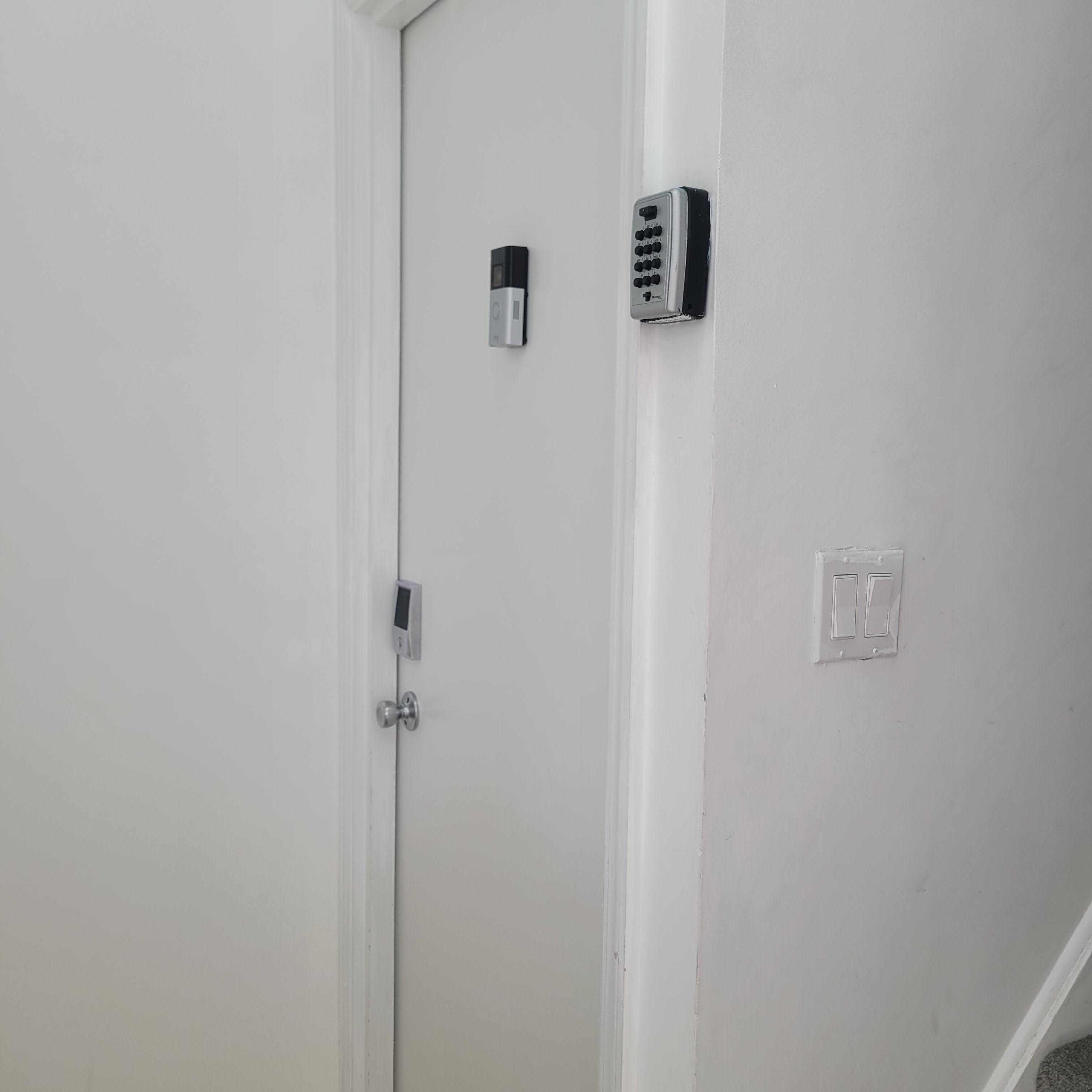 There are multiple places a person can input a code. It is the black panel on the door. Not the master box