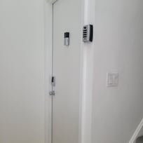 There are multiple places a person can input a code. It is the black panel on the door. Not the master box