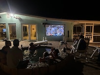 Great way to watch March Madness. We brought the screen & projector.
