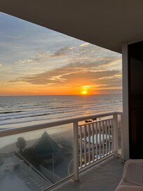 Watching sun rise from balcony